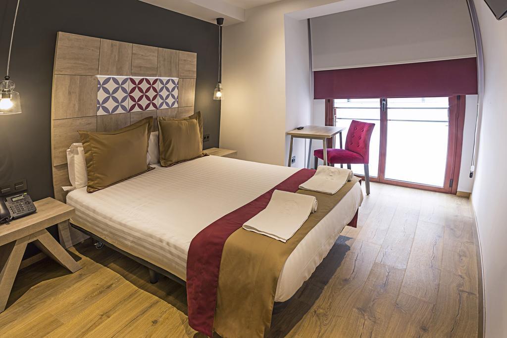Boutique Hostemplo Sagrada Familia Hotel Барселона Стая снимка